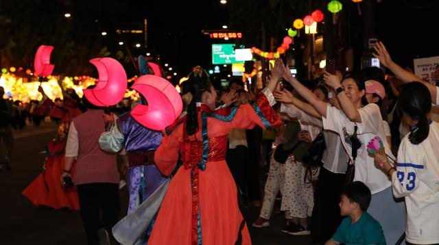 Participants take part in the Yeondeunghoe lantern parade near Bosingak in Seoul’s Jongno District on May 16, 2026, ahead of Buddha's Birthday. AJP Yoo Na-hyun.