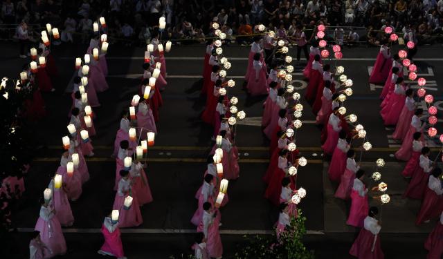 Participants take part in the Yeondeunghoe lantern parade near Bosingak in Seoul’s Jongno District on May 16 2026 ahead of Buddhas Birthday AJP Yoo Na-hyun



