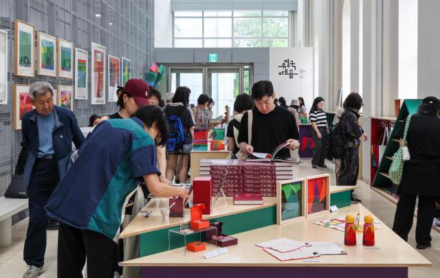 Visitors view works during the retrospective exhibition of Korean abstract art pioneer Yoo Youngkuk at Seoul Museum of Art Seosomun Main Branch in central Seoul on May 19 2026 AJP Yoo Na-hyun
