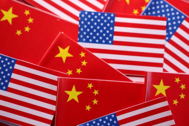 US and Chinese flags are seen in this illustration created on March 20 2025 REUTERSYonhap