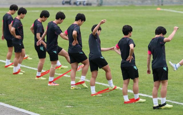 North Korean footballers warm up at a stadium in Suwon Gyeonggi Province on May 19 2026 ahead of their semifinal match against Suwon FC Women later in the day Yonhap