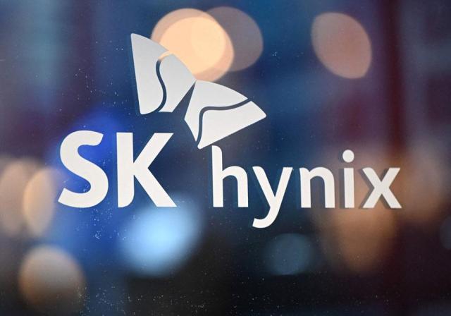The logo of SK hynix is displayed on a glass wall during an IT expo in Seoul on April 22 2026 AFP-Yonhap