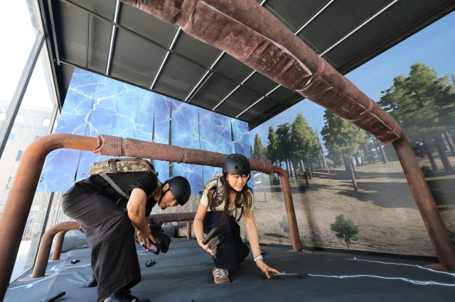 Visitors experience interactive booths at the “Area 8” pop-up store at PUBG Seongsu in Seoul’s Seongsu district on May 22 2026 AJP Han Jun-gu