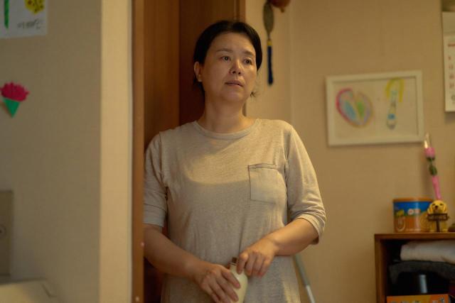 영화 세계의 주인 한 장면 사진바른손이앤에이