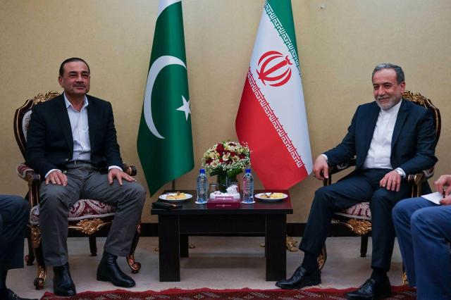 Irans Foreign Minister Abbas Araghchi right meets with Pakistans Army Chief Syed Asim Munir in Tehran on May 23 2026 Courtesy of the Iranian Foreign Ministry