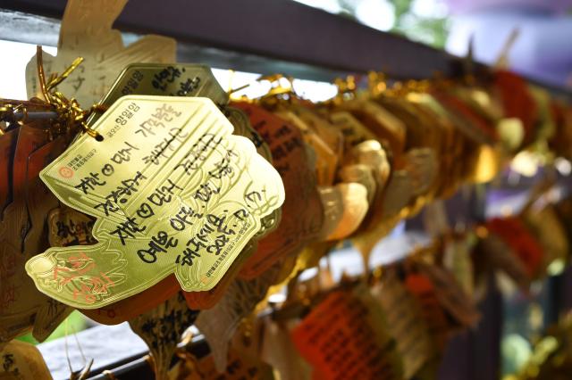 Wish tags hang at Hyangiram Hermitage in Yeosu South Jeolla Province on May 24 2026 as visitors mark Buddha’s Birthday AJP Joonha Yoo