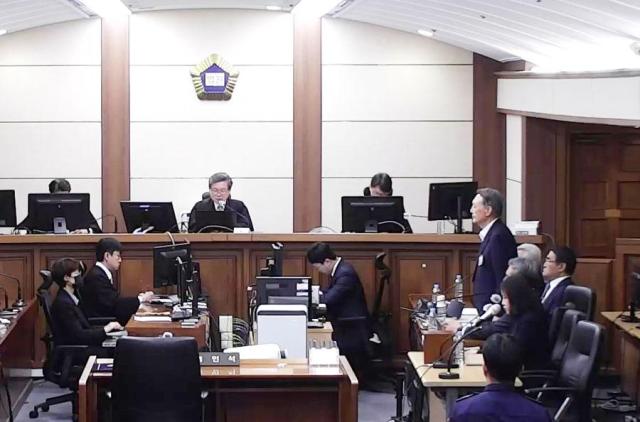 Impeached ex-president cleared of perjury charges in martial law-related case