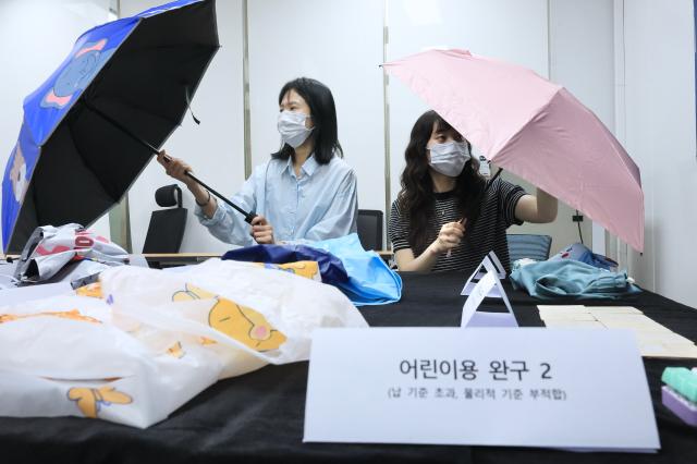 Seoul city officials display products that failed overseas online platform safety inspections at Seoul City Hall on May 28 2026