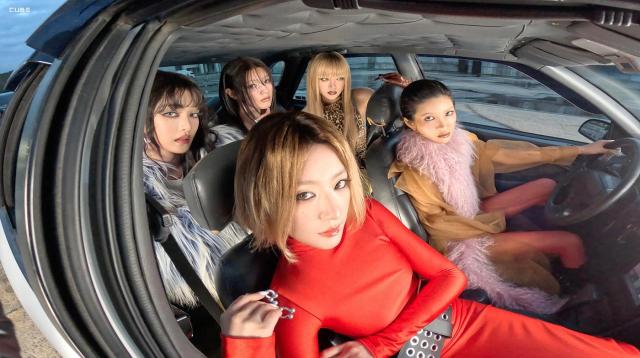 Members of K-pop girl group i-dle appear in a concept photo for their eighth mini album “We Are” in this photo Courtesy of Cube Entertainment