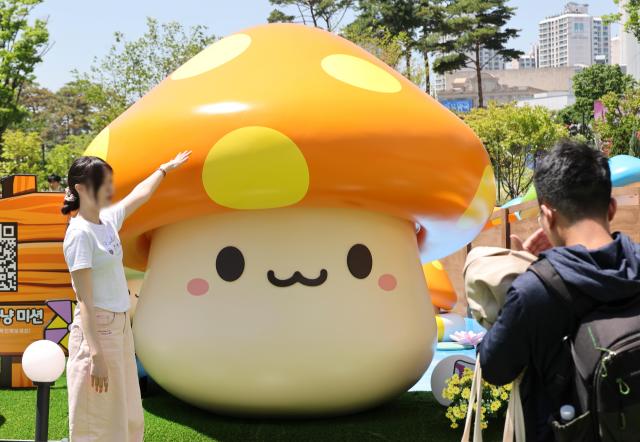 MapleStory-themed installations are displayed during MAPLE ATTACK with LOTTE a special event marking the 23rd anniversary of Nexons online game MapleStory in Songpa District Seoul on May 22 2026 AJP Yoo Na-hyun