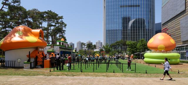 MapleStory-themed installations are displayed during MAPLE ATTACK with LOTTE a special event marking the 23rd anniversary of Nexons online game MapleStory in Songpa District Seoul on May 22 2026 AJP Yoo Na-hyun

