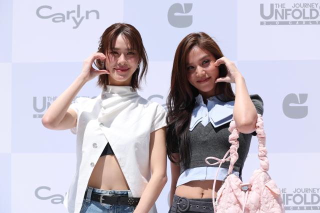 EMI and BONNIE Thai actresses pose for a photo during a promotional event for fashion brand CARLYN at the brand’s Hongdae flagship store in Seoul on May 29 2026 AJP Yoo Na-hyun