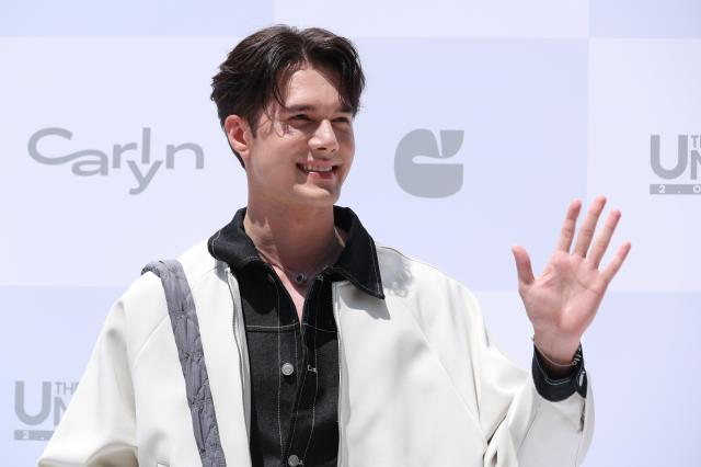 MIK a Thai actor poses for a photo during a promotional event for fashion brand CARLYN at the brand’s Hongdae flagship store in Seoul on May 29 2026 AJP Yoo Na-hyun