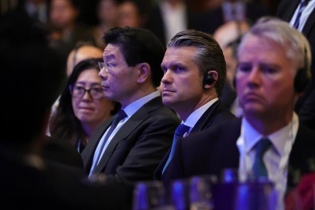 US Secretary of Defense Pete Hegseth C attends the opening of the International Institute for Strategic Studies IISS Shangri-la Dialogue Defence Summit in Singapore 29 May 2026 Defense ministers and officials from 44 countries are gathered in the city-state for the IISS Shangri-la Dialogue an annual high-level defense summit in the Asia Pacific region EPAYonhap