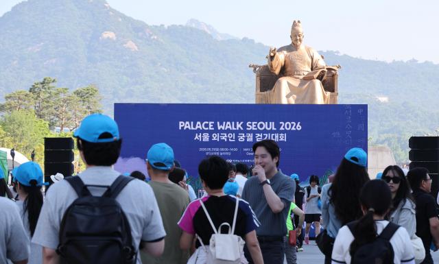 Participants of Palace Walk Seoul 2026 head to the Gyeongbokgung Palace in central Seoul on May 31 AJP Yoo Na-hyun