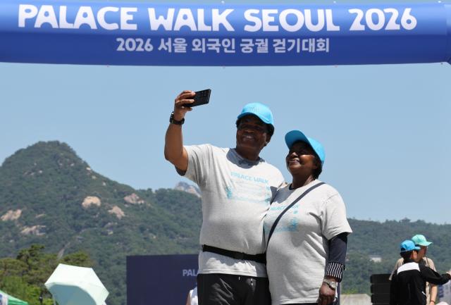 Participants of Palace Walk Seoul 2026 enter the Gyeongbokgung Palace in central Seoul on May 31 2026 AJP Yoo Na-hyun