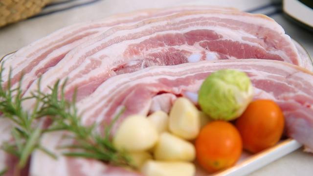 This image showcases pork belly before getting grilled alongside various vegetables Courtesy of National Institute of Animal Science