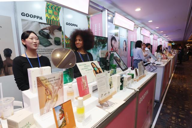 Booths showcasing K-beauty products are set up at the entrance of the 2026 Korea-Africa Business Forum at the Lotte Hotel Seoul in Jung-gu Seoul on June 2 2026 Yonhap 