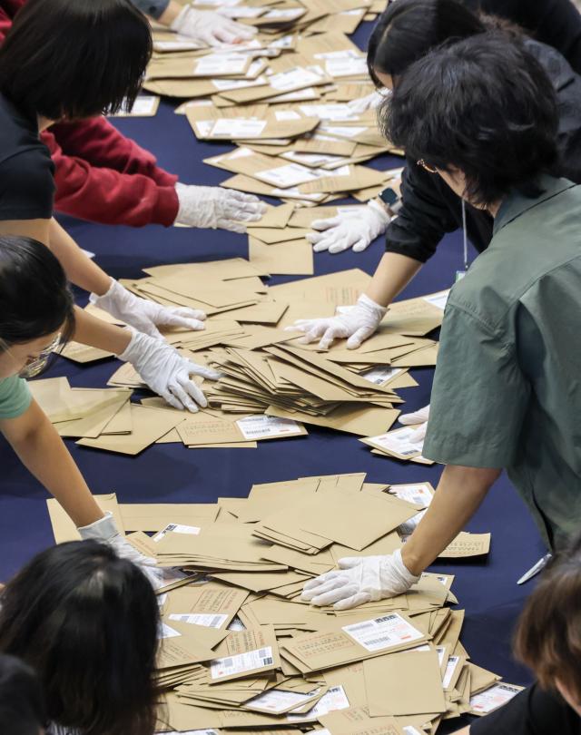 Ballots from early voting are counted at the Gwanak-gu Election Commission counting station set up at Seoul National University gymnasium in Gwanak-gu Seoul on June 3 2026 AJP Yoo Na-hyun