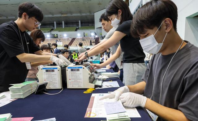 Ballots are counted at the Gwanak-gu Election Commission counting station set up at Seoul National University gymnasium in Gwanak-gu Seoul on June 3 2026 AJP Yoo Na-hyun