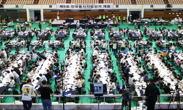 Ballots from early voting are counted at the Gwanak-gu Election Commission counting station set up at Seoul National University gymnasium in Gwanak-gu Seoul on the afternoon of June 3 2026 AJP Yoo Na-hyun