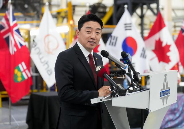 Kang Hoon-sik chief of staff to the president of South Korea speaks to employees as he visits Martinrea International in Woodbridge Ontario Canada on June 1 2026 AP-Yonhap