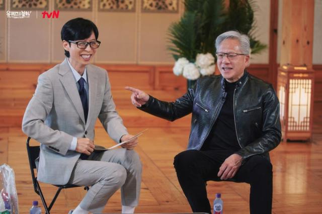 Nvidia CEO Jensen Huang sits with host Yoo Jae-suk during a taping of tvN’s “You Quiz on the Block” Courtesy of tvN