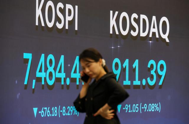 The KOSPI and KOSDAQ indexes are displayed on an electronic board at the Korea Exchange KRX headquarters in Yeouido western Seoul on June 8 2026 AJP Yoo Na-hyun


