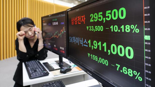 The KOSPI and KOSDAQ indexes are displayed on an electronic board at the Korea Exchange KRX headquarters in Yeouido western Seoul on June 8 AJP Yoo Na-hyun