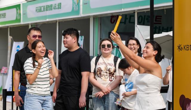 Visitors and foreign tourists explore exhibition booths during the 2026 Seoul Health Show at Seoul Plaza in central Seoul on June 9 2026 AJP Yoo Na-hyun