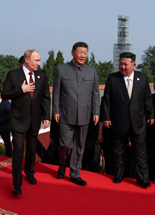 Russian President Vladimir Putin Chinese President Xi Jinping and North Korean leader Kim Jong-un arrive for a military parade marking the 80th anniversary of the end of World War Two in Beijing China September 3 2025 Reuters-Yonhap 