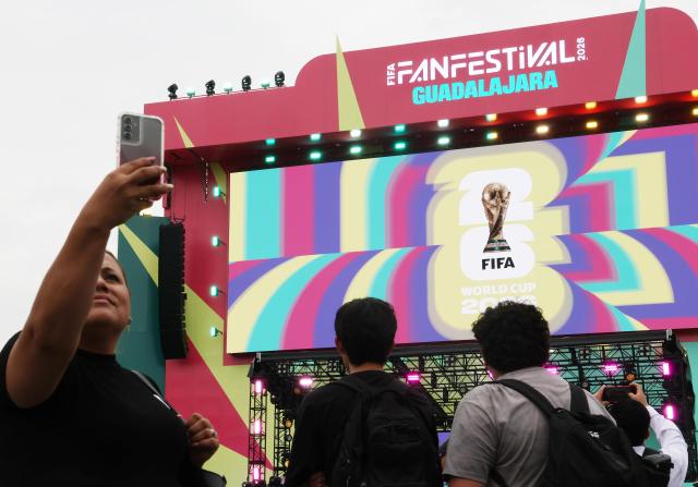 Citizens take commemorative photos at a World Cup promotional event in Guadalajara, Mexico, on June 9.