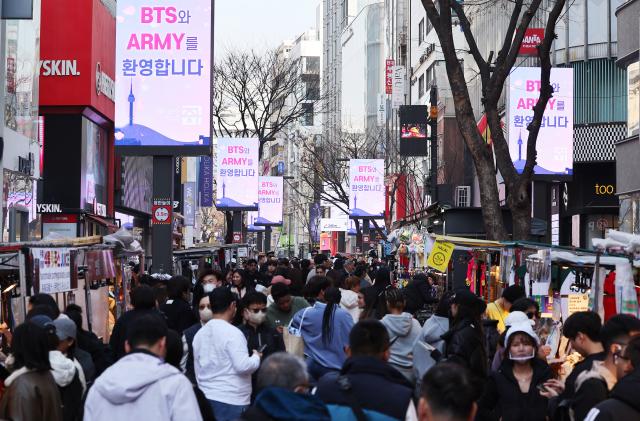 Crowds in Myeongdong celebrating BTS comeback