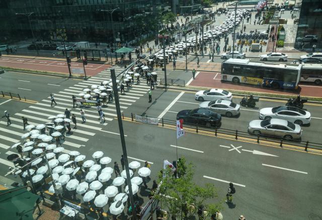 Members of the Kakao chapter of the Korean Chemical and Textile Workers Union and supporting union members hold a strike rally demanding higher performance-based compensation during Kakaos first-ever labor strike at Pangyo Station Plaza in Seongnam Gyeonggi Province on June 10 2026 AJP Yoo Na-hyun