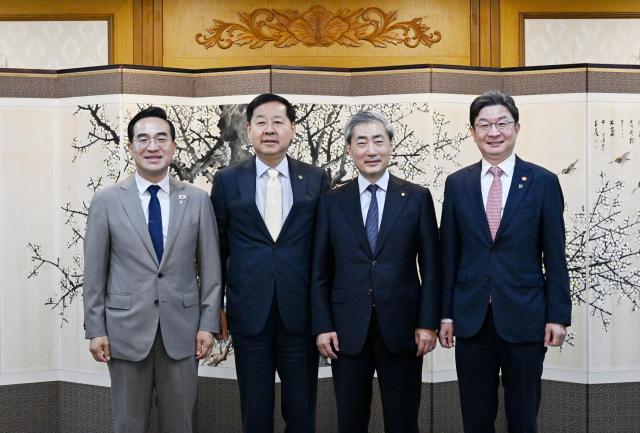 Participants pose for a photo during an expanded macroeconomic fiscal and financial policy meeting at the Government Complex Seoul in Jongno District Seoul on June 10 2026

From left are Budget Minister Park Hong-keun Deputy Prime Minister and Minister of Economy and Finance Koo Yun-cheol Bank of Korea Governor Shin Hyun-song and Financial Services Commission Chairman Lee Eog-weon Ministry of Planning and Budget