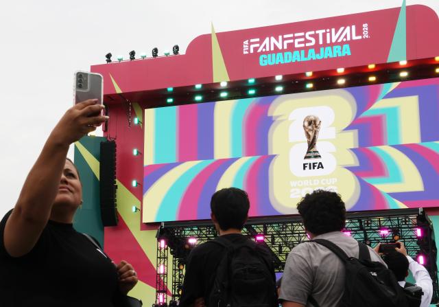 Citizens take photos at a World Cup promotional square in downtown Guadalajara Mexico on June 9 ahead of the 2026 FIFA World Cup Courtesy of Yonhap News Agency