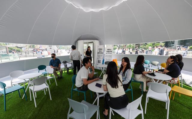 An outdoor heat-relief shelter known as Happyso featuring an air-conditioned dome structure is in operation at Gwanghwamun Square in central Seoul on June 11 2026 AJP Yoo Na-hyun
