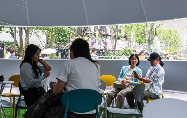 An outdoor heat-relief shelter known as Happyso featuring an air-conditioned dome structure is in operation at Gwanghwamun Square in central Seoul on June 11 2026 AJP Yoo Na-hyun