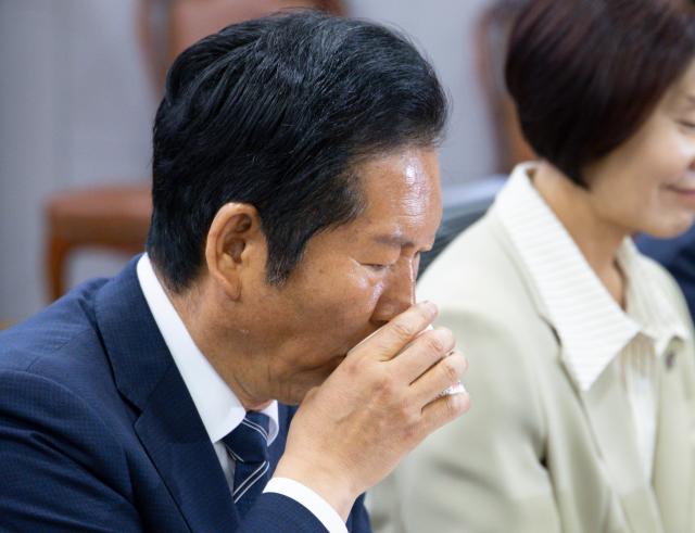 Democratic Party leader Jung Chung-rae drinks water before speaking at a forum marking the first anniversary of the Lee Jae Myung administration at the National Assembly Members Office Building in Seoul June 11 2026 Yonhap 