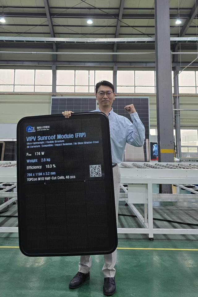 Professor Joung Young-soo chief executive of ACE Inventor and a professor of mechanical systems engineering introduces the newly unveiled vehicle-integrated photovoltaic VIPV sunroof module Courtesy of Sookmyung Womens University