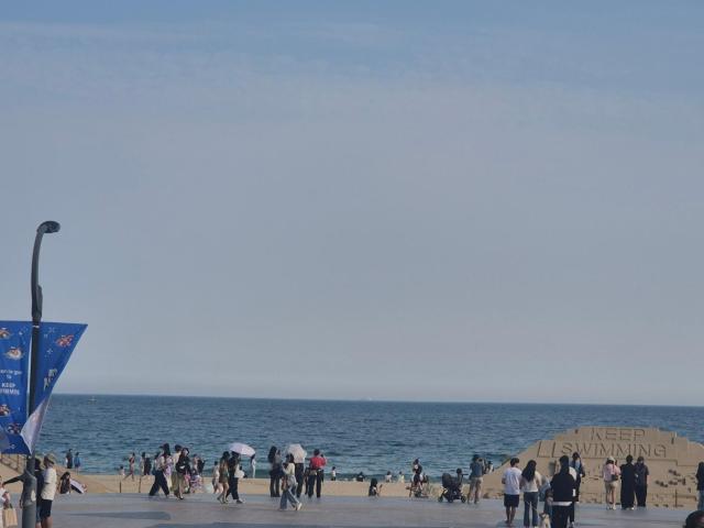 Visitors enjoy Haeundae Beach in Busan ahead of BTSs ARIRANG world tour concerts June 10 2026 AJP Seo Hye-seung