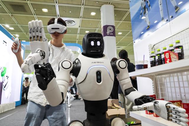 Visitors explore exhibits at Smart Tech Korea 2026 at COEX in Seouls Gangnam District on June 11 2026 

