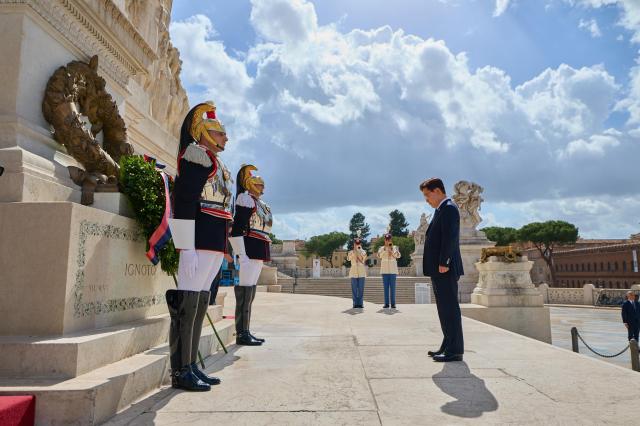 South Korean President Lee Jae Myung who is on a state visit to Italy observes a moment of silence after laying a wreath at the Tomb of the Unknown Soldier in Rome on June 11 2026 local time Yonhap 
