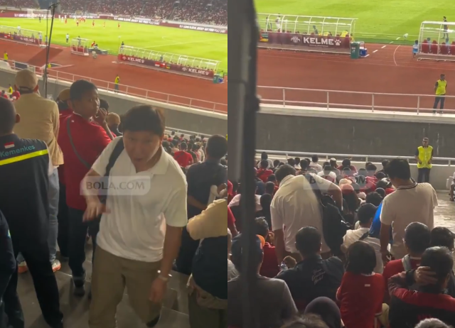 Vietnam coach Kim Sang-sik draws attention at an Indonesian stadium.