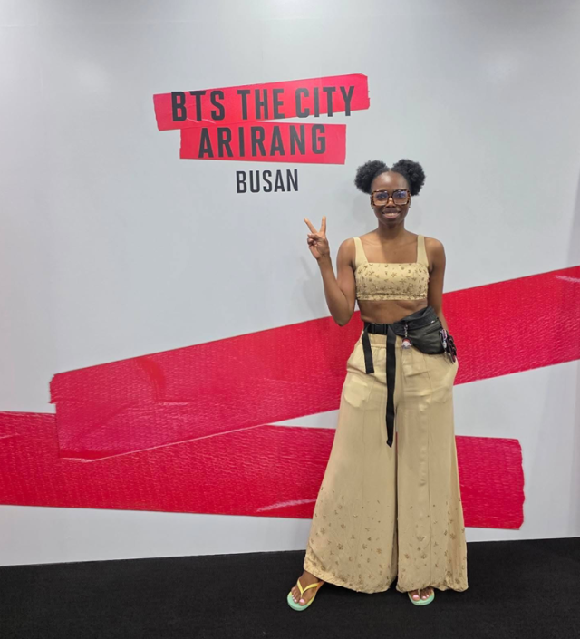 Vuyo Matiwane36 from South Africa poses for a photo at a BTS THE CITY ARIRANG BUSAN display in Busan on June 12 2026 Courtesy of Vuyo Matiwane