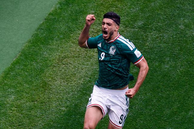 Mexicos Raul Jimenez celebrates after scoring his teams second goal APYonhap