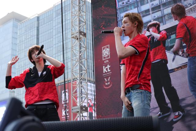 Members of K-pop group CORTIS perform onstage during a World Cup street cheering event at Gwanghwamun Square in central Seoul on Friday, ahead of South Korea's group-stage match against Czechia. AJP Yoo Na-hyun 