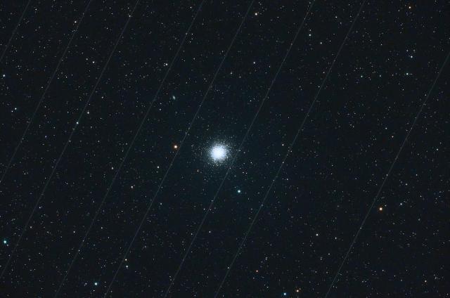 Starlink satellites streak across the night sky in this file photo Yonhap