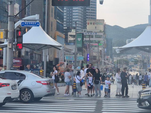 Pedestrians walk near Haeundae Beach in Busan on June 10 2026 AJP Seo Hye-seung