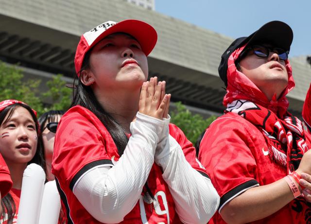 Supporters cheer while watching South Korea's Group A match against the Czechia Republic during a public viewing event for the 2026 FIFA World Cup at Gwanghwamun Square in Seoul on June 12. AJP Yoo Na-hyun



